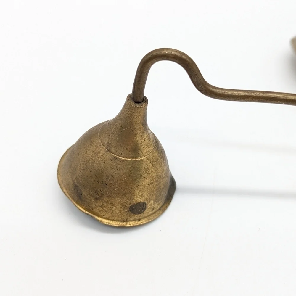 Vintage brass propeller candle holder and snuffer